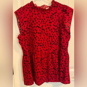 Animal print cap sleeve ruffle neck loose babydoll blouse.